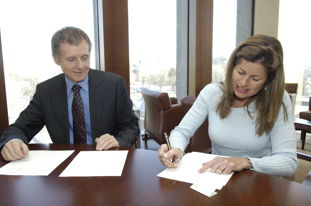 University President Alan Wildeman and ALumni Association Sue Williams